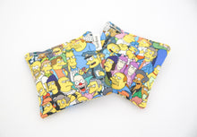 Load image into Gallery viewer, Set of two reusable hand warmers - the simpsons