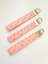 Load image into Gallery viewer, Pink Smiley Wristlet Key Ring
